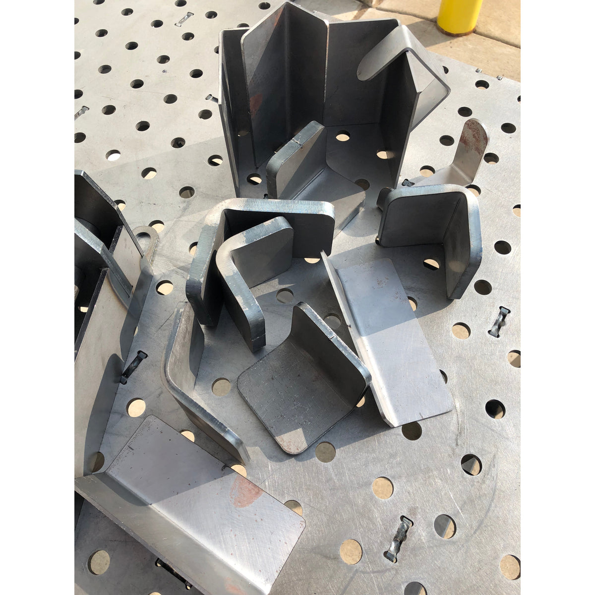 CertiFlat FabBrake - Tabletop pressbrake example of bent parts